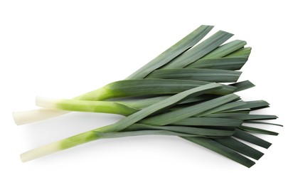 Photo of Fresh raw leeks on white background, top view