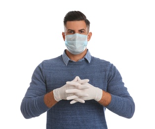 Man wearing protective face mask and medical gloves on white background
