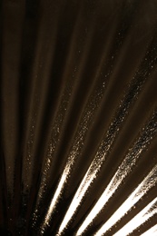 Photo of Corrugated golden texture as background, closeup view