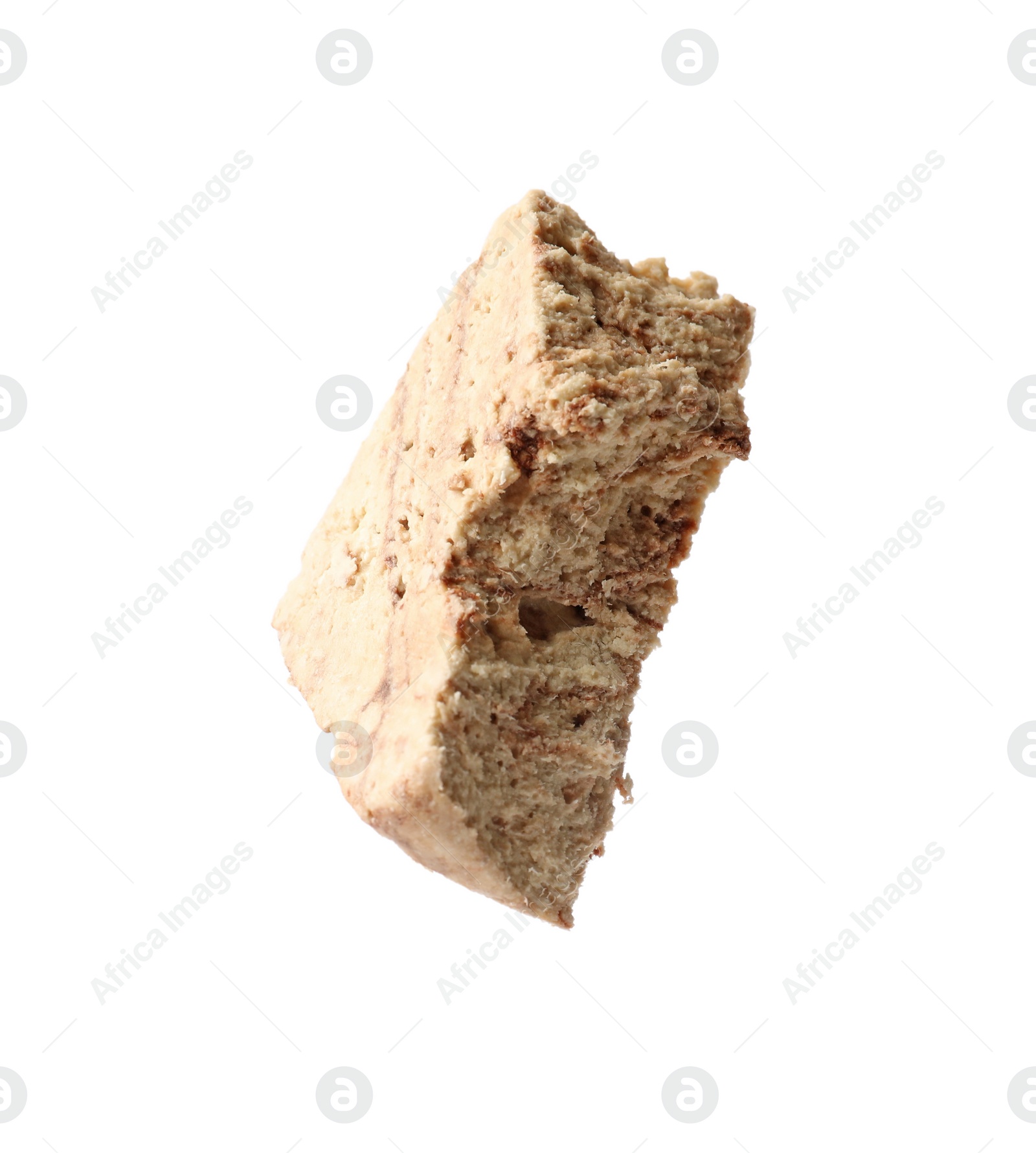 Photo of One piece of tasty chocolate halva isolated on white