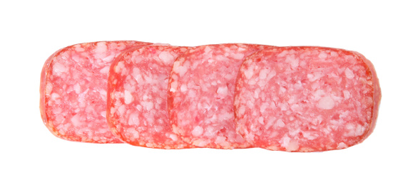Photo of Slices of delicious smoked sausage isolated on white, top view