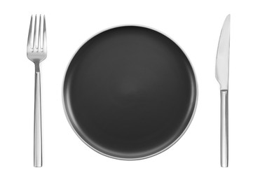 Image of Empty black plate with fork and knife on white background, top view