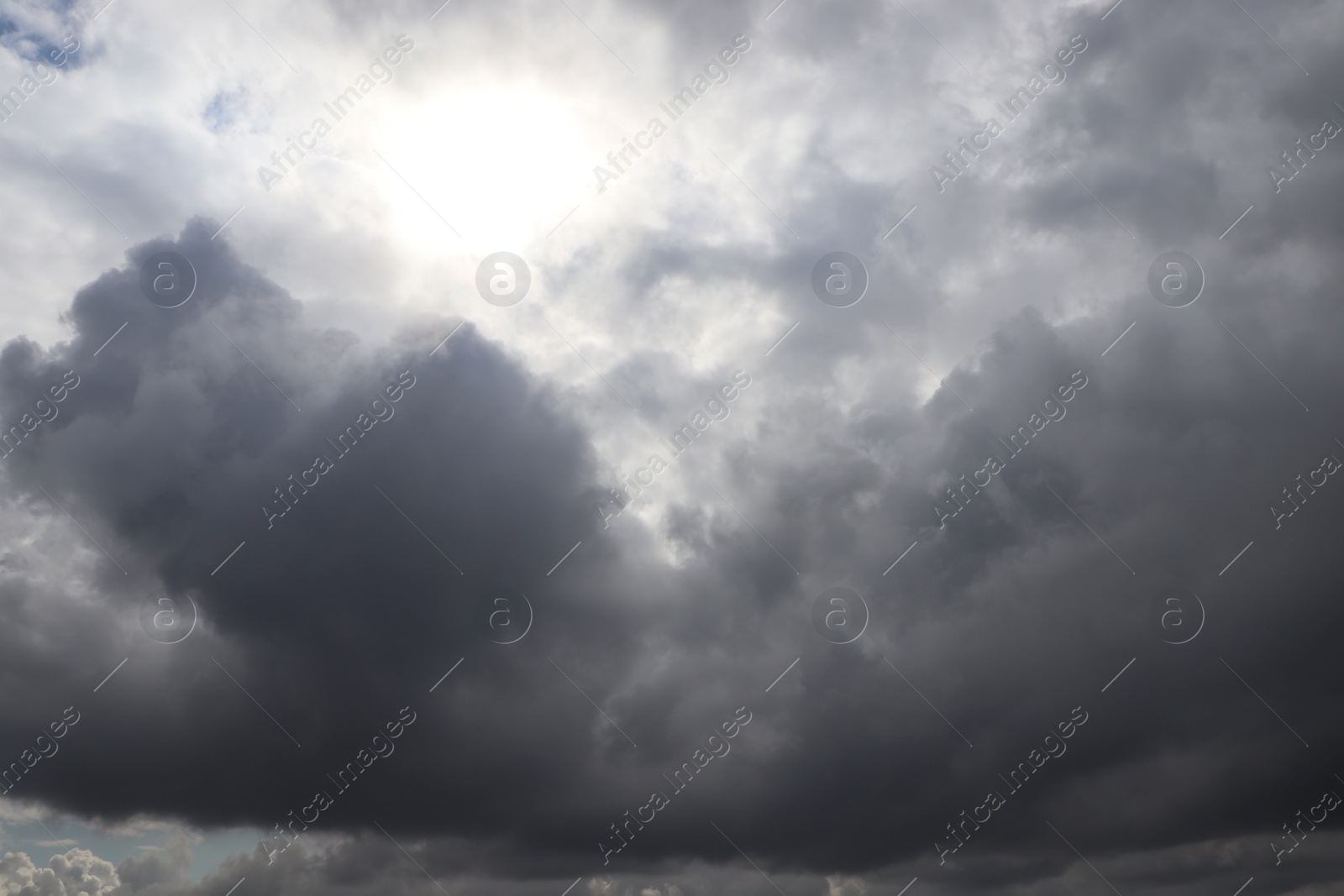 Photo of Sky with heavy rainy clouds on grey day