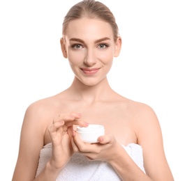 Young woman with jar of body cream on white background