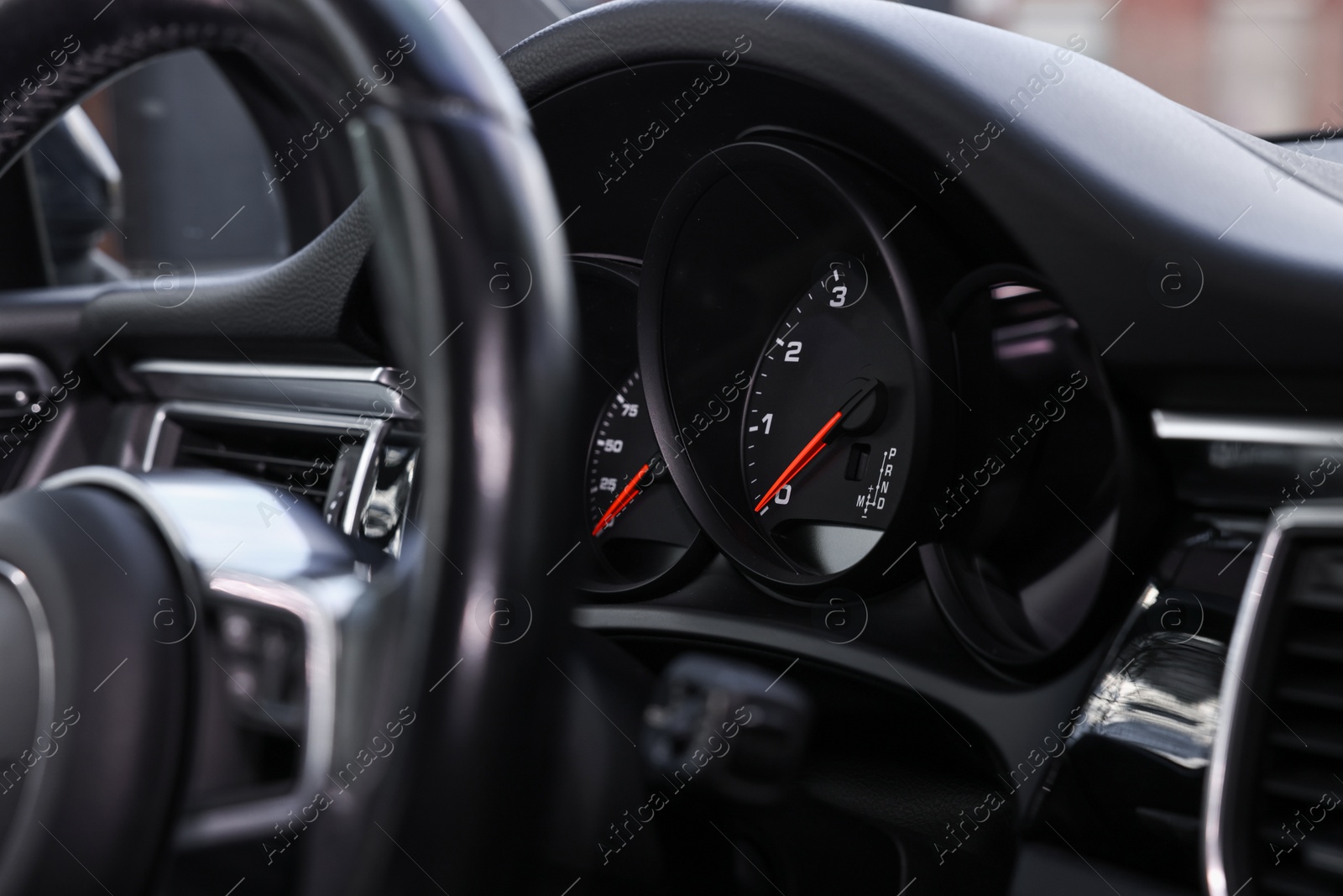 Photo of Dashboard inside of modern black car, closeup