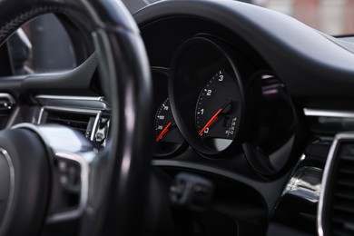 Dashboard inside of modern black car, closeup