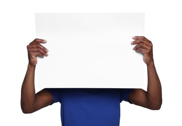 Photo of African American man holding sheet of paper on white background. Mockup for design