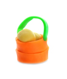 Photo of Small bucket made from play dough on white background