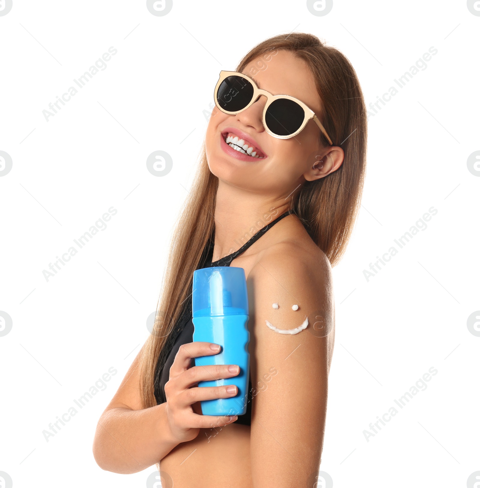 Photo of Woman with sunglasses and bottle of sun protection body cream on white background