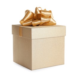 Golden gift box with satin bow on white background