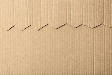 Photo of Cardboard surface as background, top view. Recyclable material