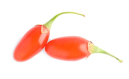 Fresh ripe goji berries on white background, top view