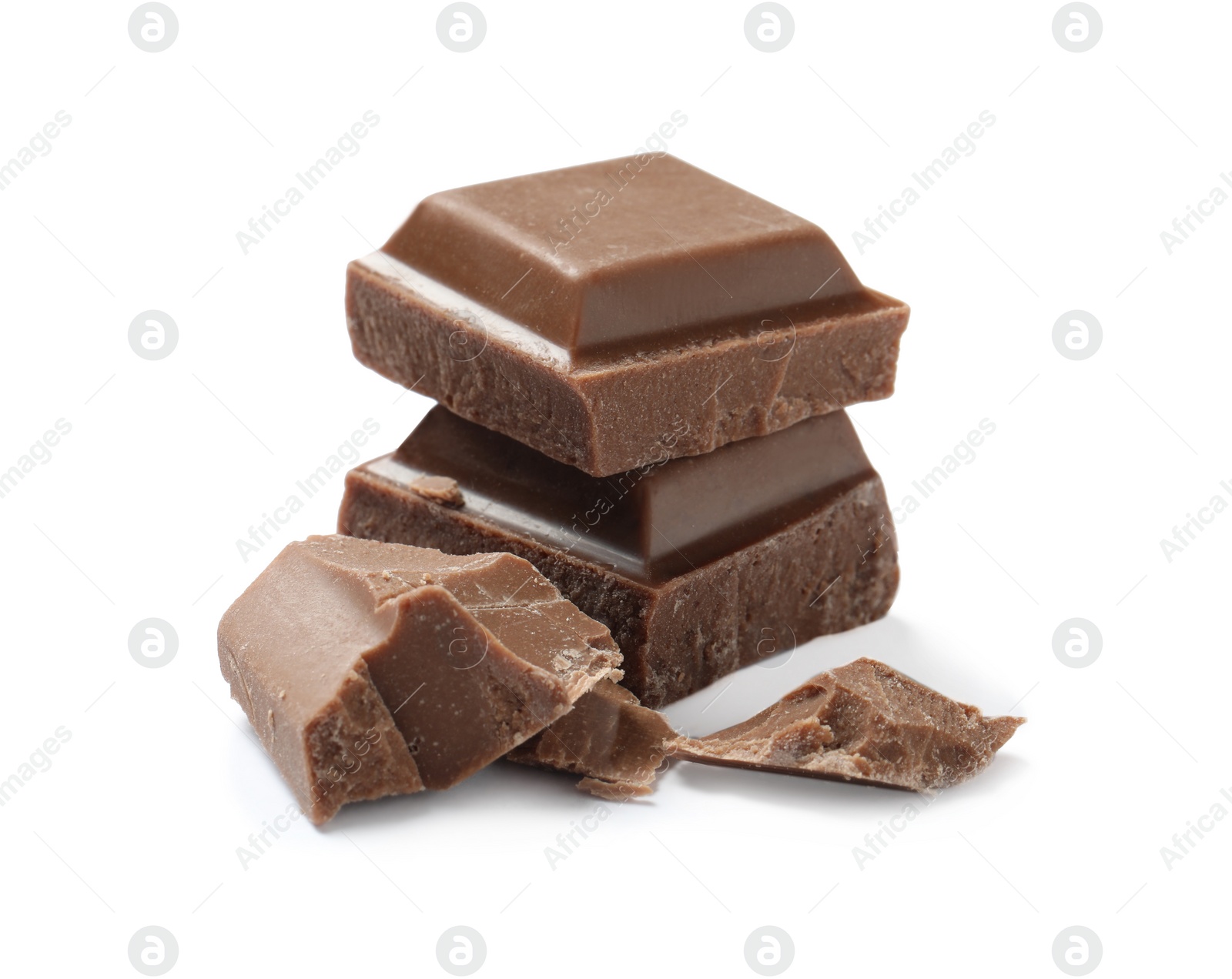 Photo of Pieces of delicious milk chocolate isolated on white