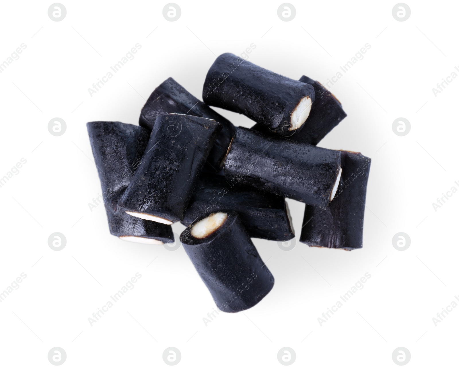 Photo of Tasty liquorice candies isolated on white, top view