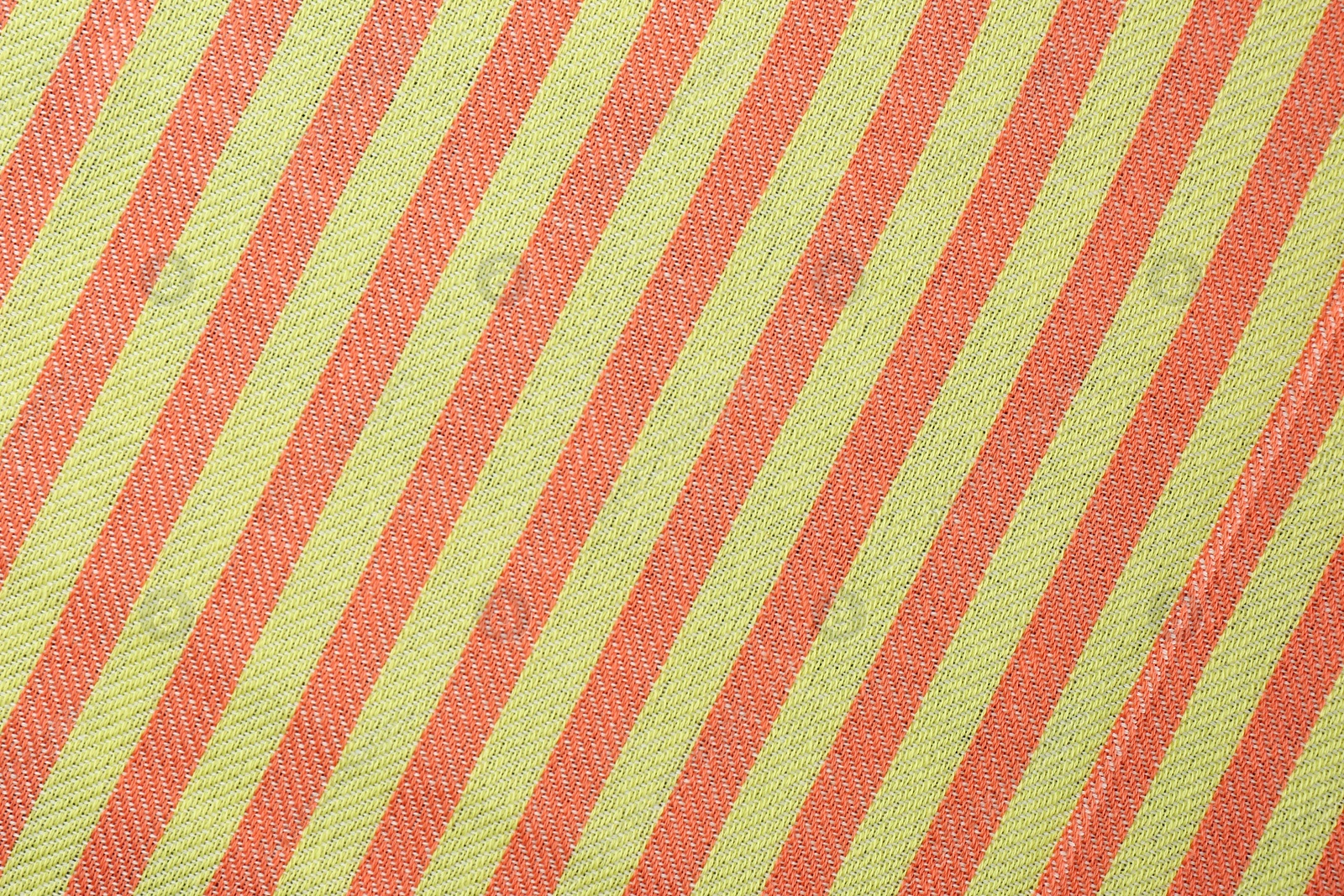 Photo of Striped beach towel as background, top view