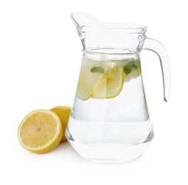 Glass jug of cold lemonade on white background