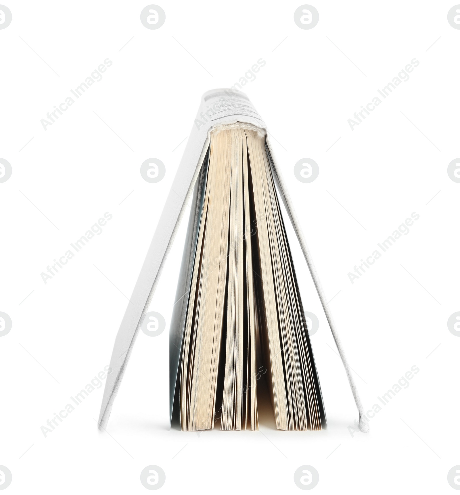 Photo of Open old hardcover book isolated on white