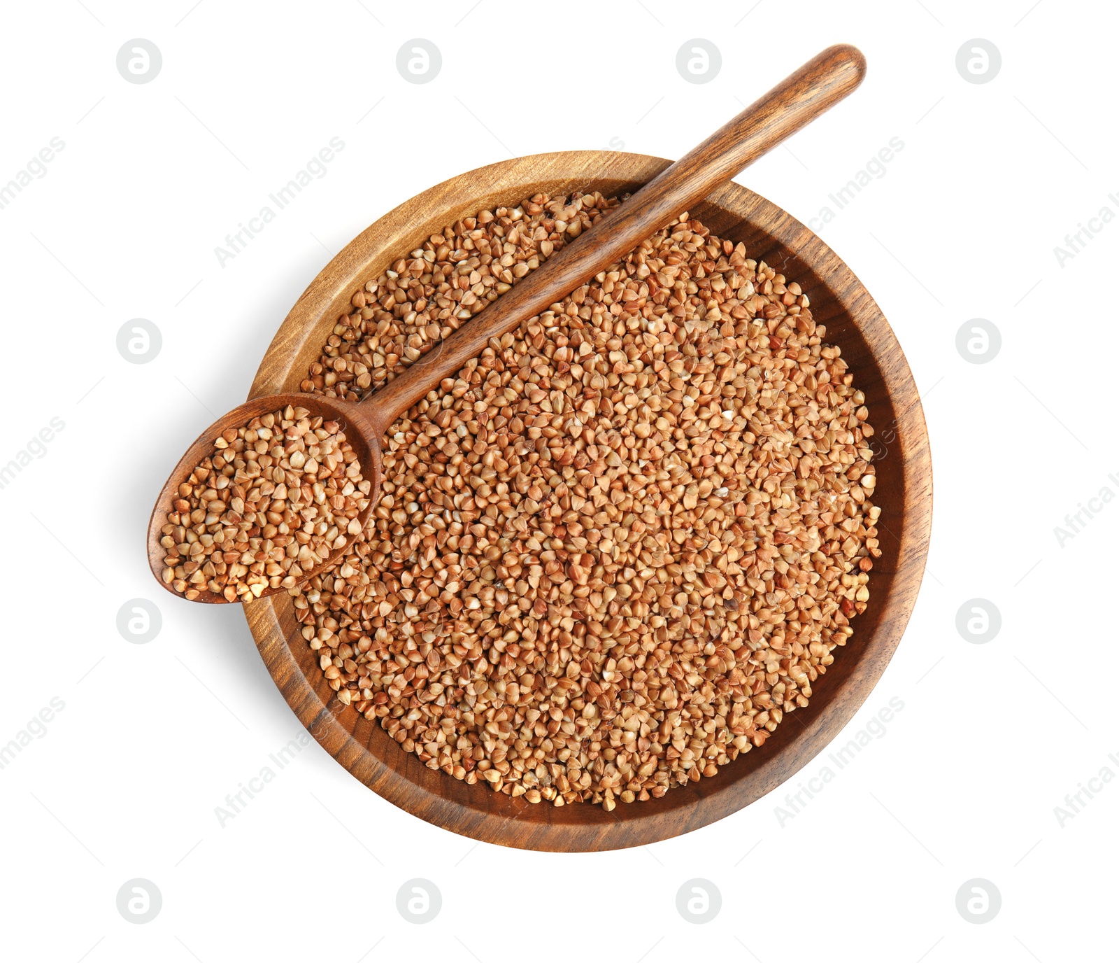 Photo of Bowl and spoon with uncooked buckwheat on white background, top view