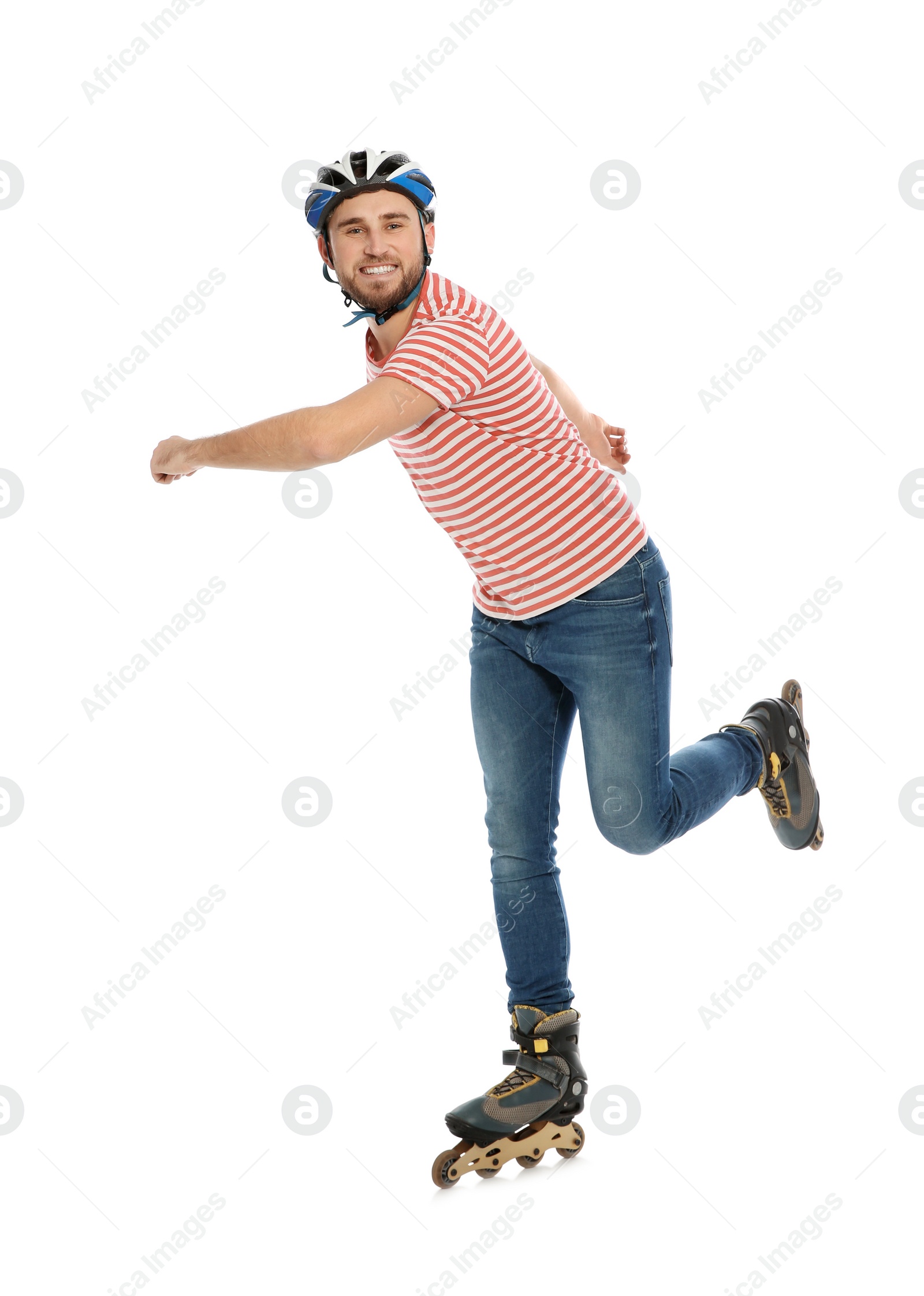 Photo of Young man with inline roller skates on white background