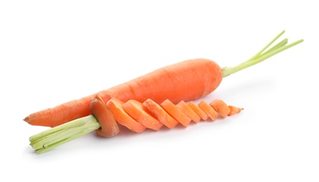 Photo of Whole and sliced ripe carrots on white background