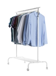 Photo of Wardrobe rack with men clothes on white background
