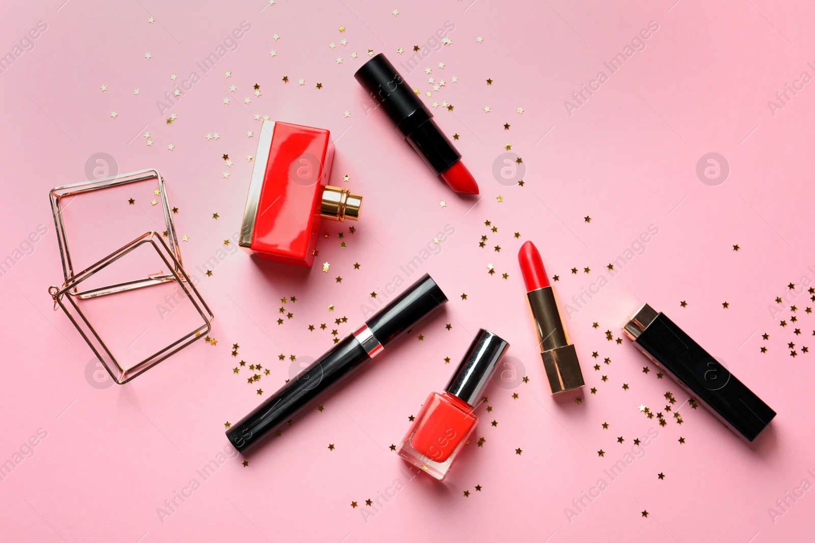 Photo of Flat lay composition with decorative cosmetics on color background