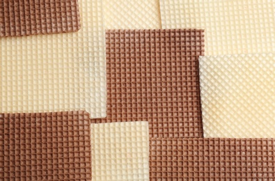 Tasty wafers as background, closeup. Crispy food