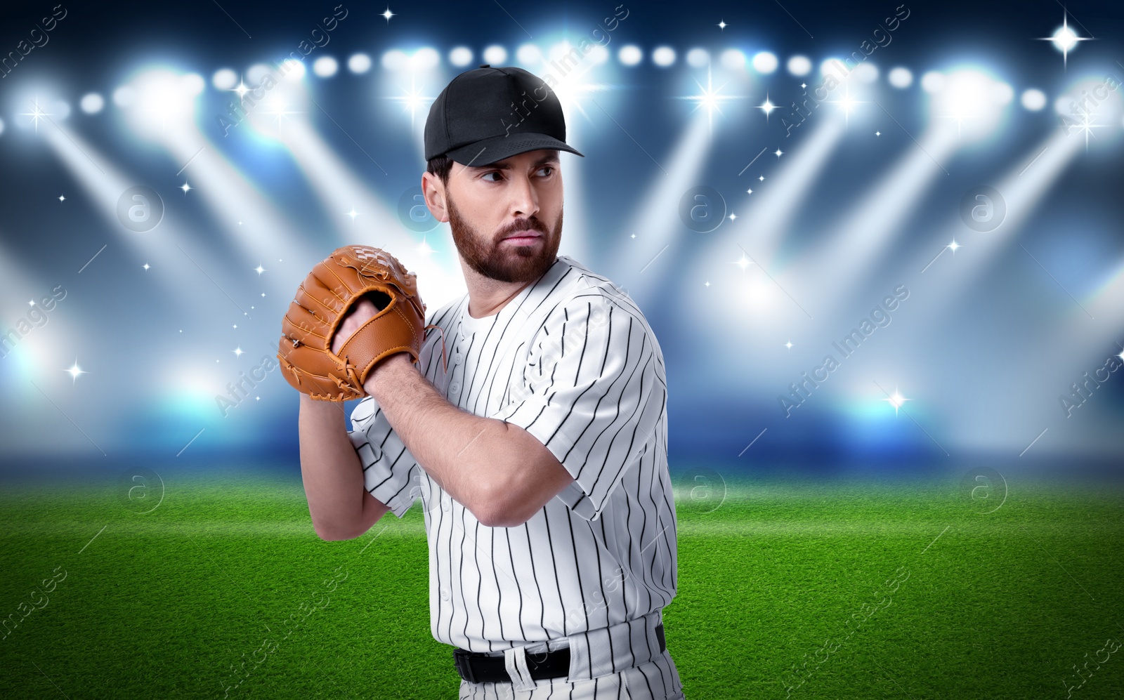 Image of Professional baseball player with glove on stadium