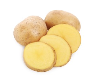 Whole and cut fresh potatoes on white background, top view