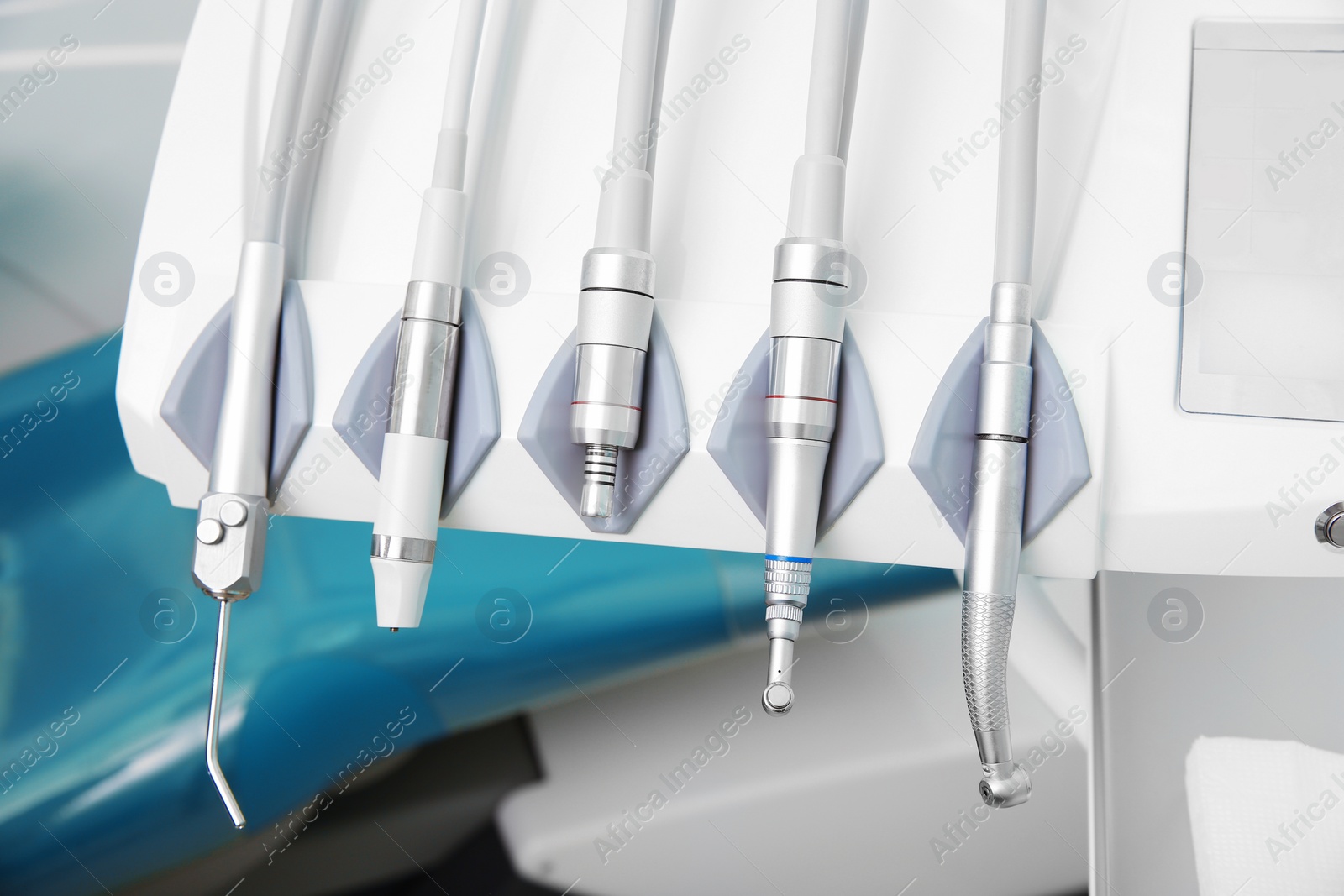 Photo of Set of professional instruments in dentist's office