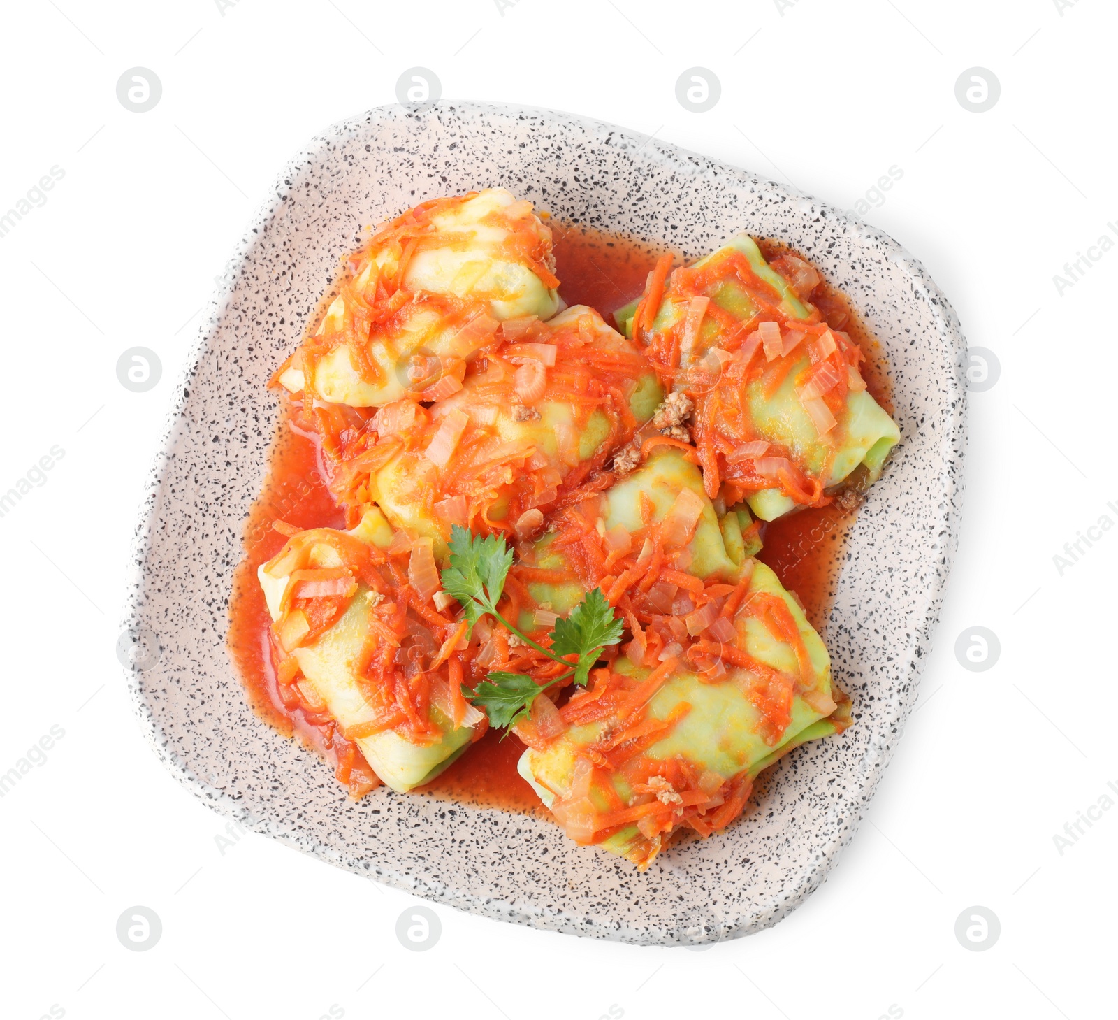 Photo of Delicious cabbage rolls with sauce isolated on white, top view