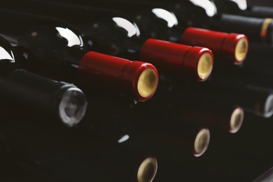 Bottles with delicious wine, closeup