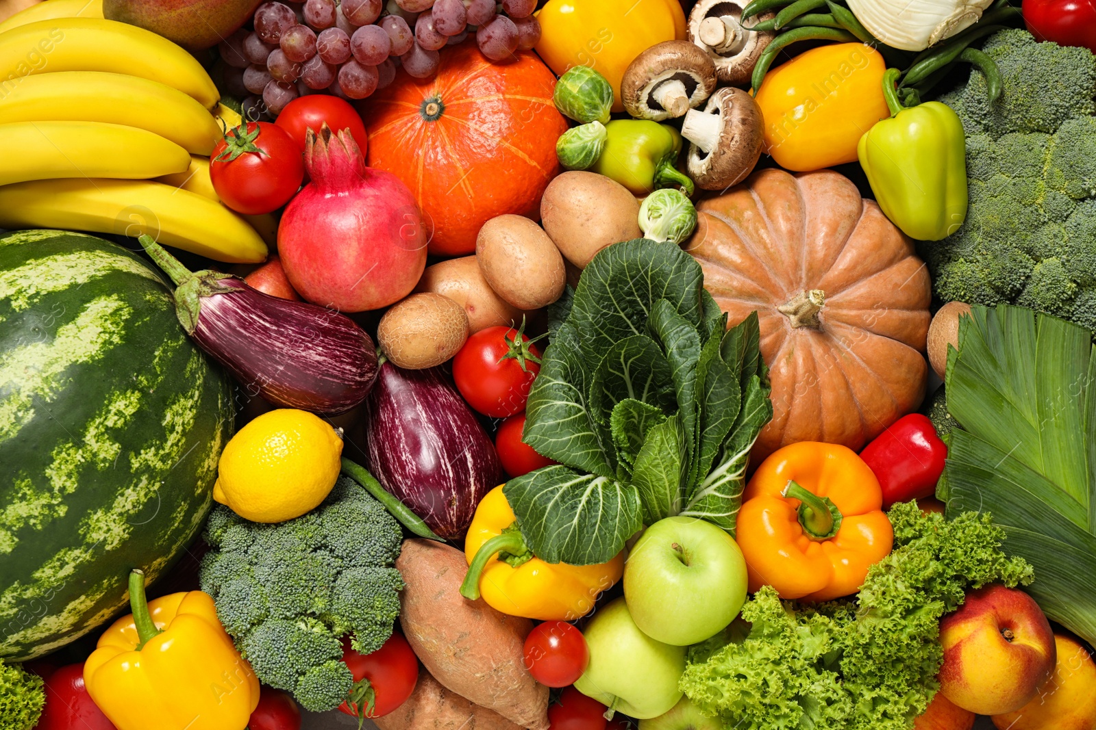 Photo of Assortment of organic fresh fruits and vegetables as background, closeup