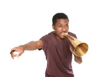 Photo of Young African-American man shouting into megaphone on white background