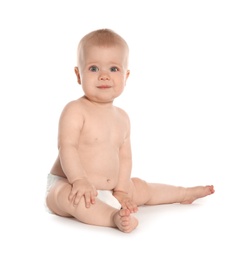 Photo of Cute little baby sitting on white background