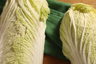 Photo of Fresh Chinese cabbages on table, top view