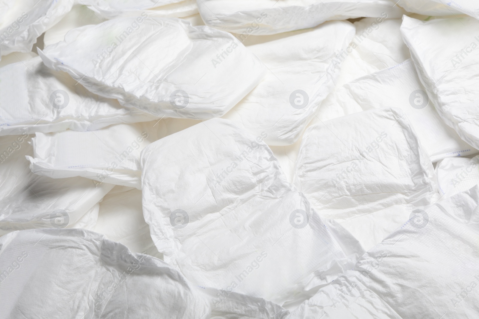 Photo of Baby diapers as background, closeup. Child's garment