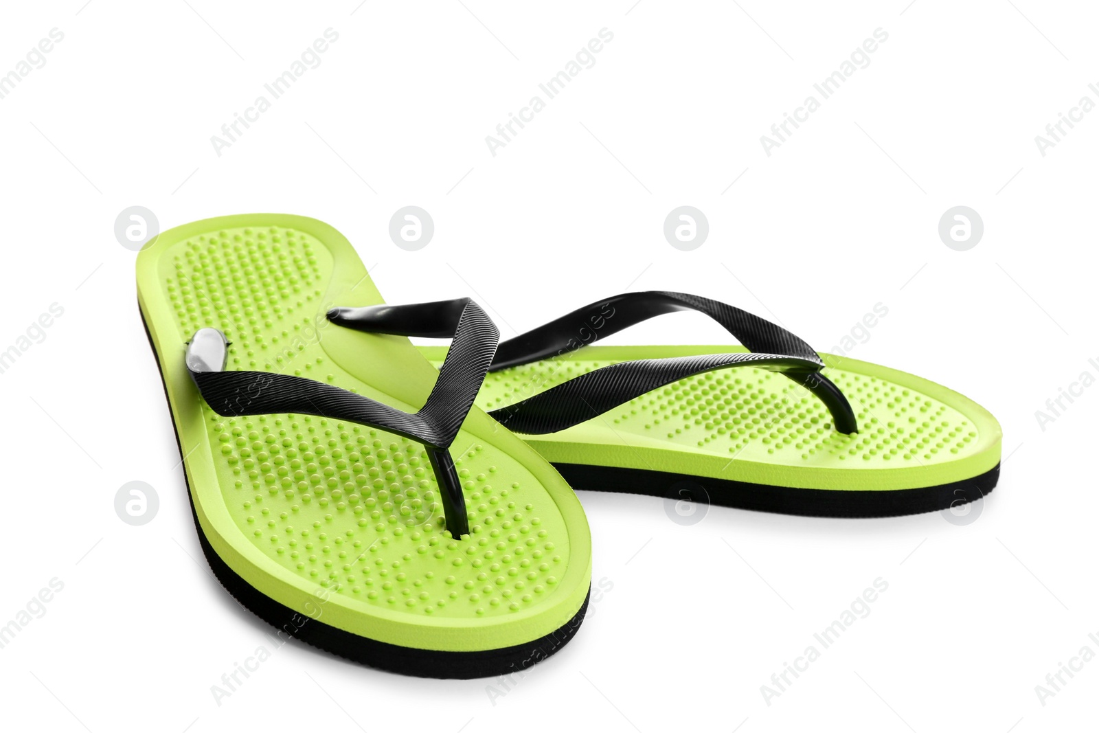 Photo of Stylish bright flip flops isolated on white