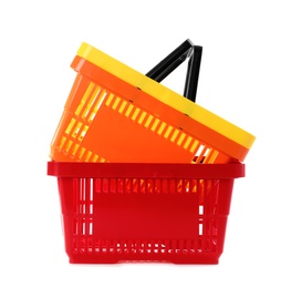 Colorful plastic shopping baskets on white background