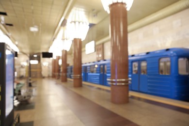 Blurred view of subway station with train. Public transport