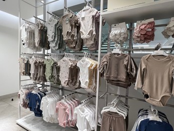 WARSAW, POLAND - JULY 17, 2022: Fashion store display with baby clothes in shopping mall