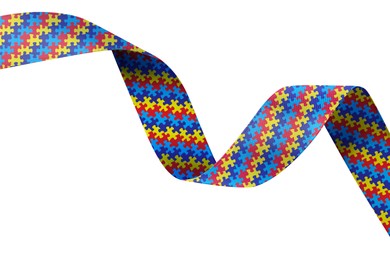 Image of World Autism Awareness Day. Colorful puzzle ribbon on white background