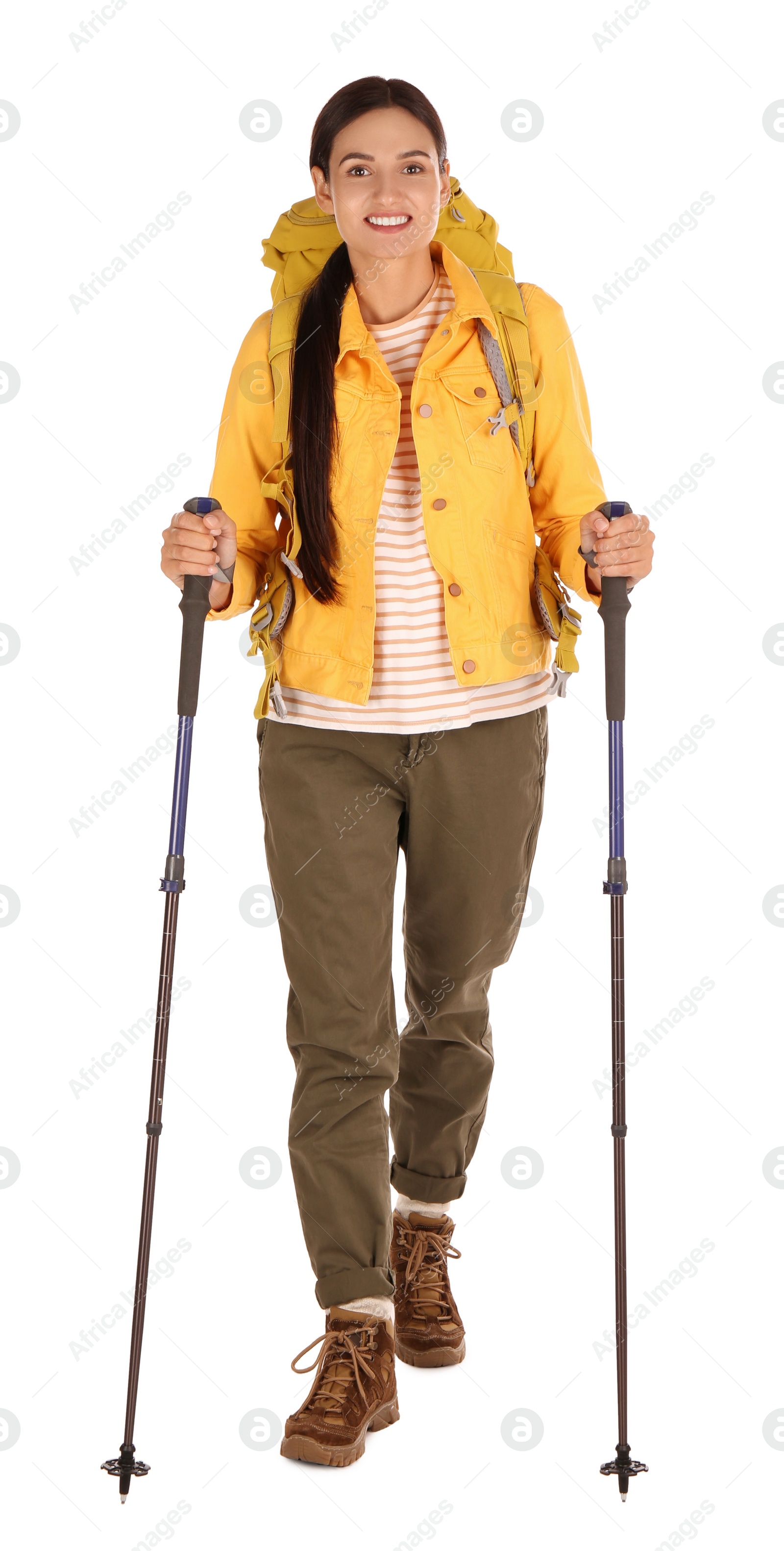 Photo of Female hiker with backpack and trekking poles on white background