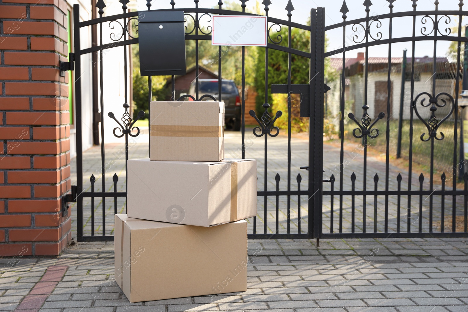 Photo of Stack of parcels delivered near front gates