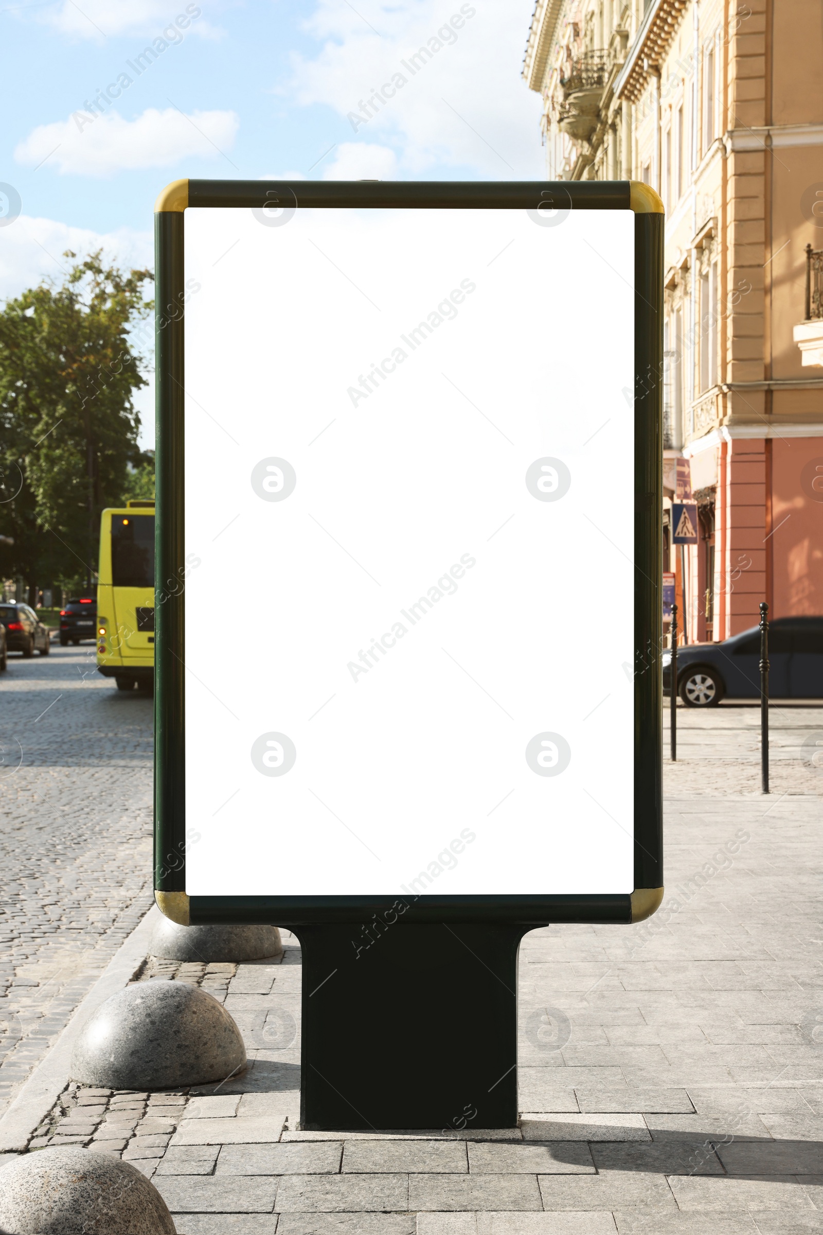 Photo of Blank citylight poster on street in city. Space for design