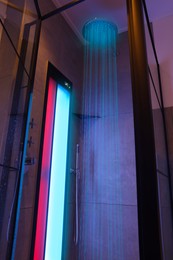 Photo of Modern shower with Infrared spectrum, UV light and flowing water