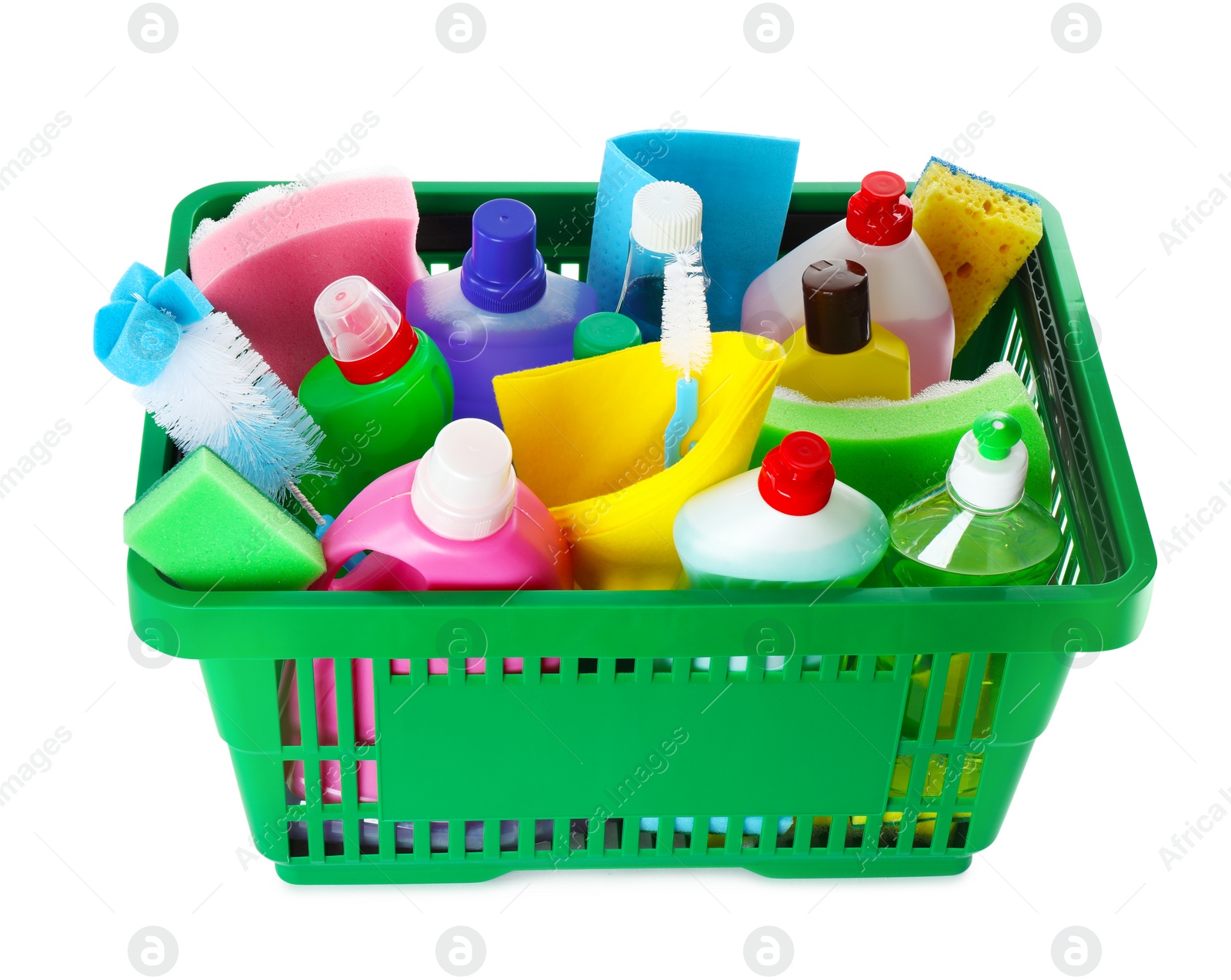 Photo of Green shopping basket with different household chemicals on white background