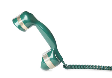 Handset of vintage green telephone isolated on white