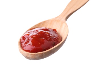 Wooden spoon with red sauce on white background