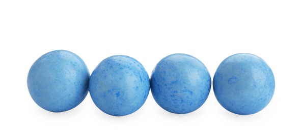 Photo of Light blue chewy gumballs isolated on white